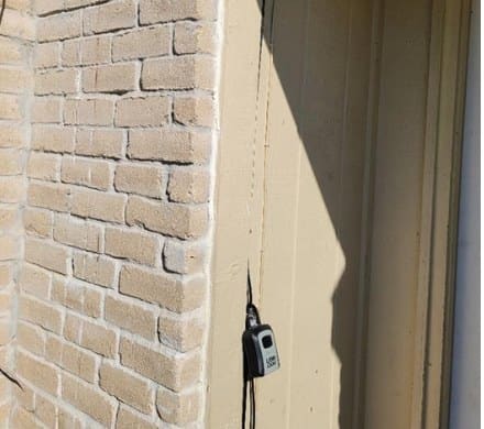 Repainted brick corner and entry door